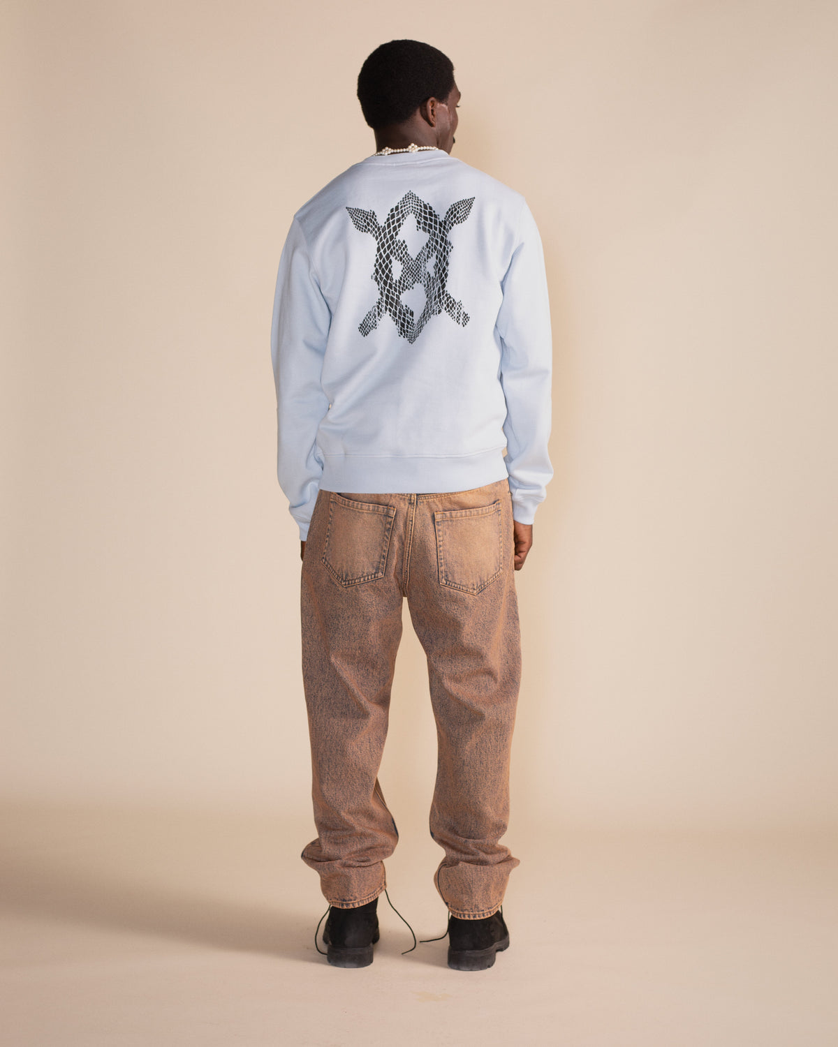 Skyway Blue Snake Shield Sweater